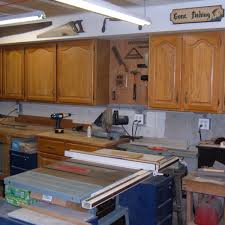 This breadbox built into the corner of the kitchen cabinetry makes clever use of an awkward space. My Woodshop Storage Ideas Recycling Kitchen Cabinets Into Garage Storage Units Dengarden