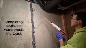 how to fix a leak in a basement wall