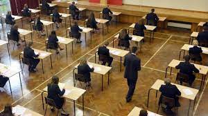 GCSEs: Pass mark raised in exams shake-up - BBC News