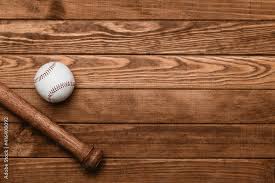 baseball bat and ball on wooden floor