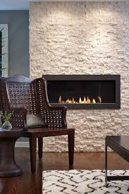 white limestone wall with fireplace and