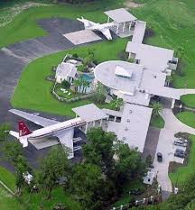 At the time, john told the magazine the maine mansion had good bones but just needed some updating. John Travolta S Mansion With A Private Runway For His Two Aircrafts Capelux Com John Travolta House Florida Mansion Celebrity Houses