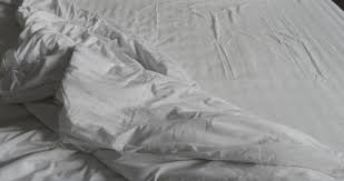 crumpled messy white blanket untidy
