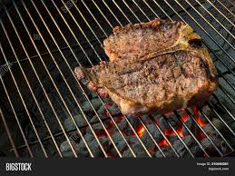 The flavor is just wonderful. T Bone Steak Grilling Image Photo Free Trial Bigstock
