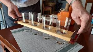 beer flight with four glasses