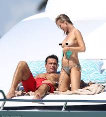I try to make the best of it and soak up some happy rays and sunbathe. Real Housewives Joanna Krupa Topless Aboard Yacht With Husband Romain Zago Daily Mail Online