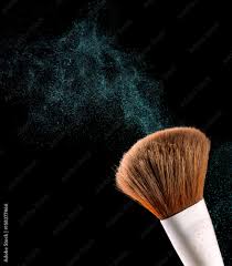 cosmetic makeup brushes on black