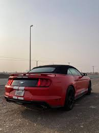 uae in a ford mustang convertible