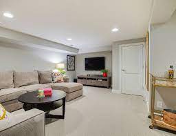 The basement is the ideal place to create a cozy and stylish bedroom for family or guests as well. Benjamin Moore 1465 Nimbus Neutral Basement Paint Color Benjamin Moore1465 Nimbus Basement P House Remodel Design Basement Paint Colors Basement Living Rooms