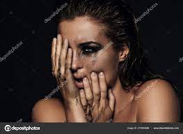 smudged makeup on her face stock photo