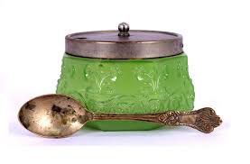 green glass sugar bowl with spoon