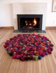 how to diy pompom rugs to snuggle by