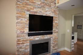 over fireplace led tv installation with