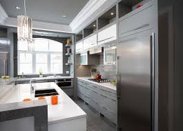 The gloss doors reflect light which makes for a brighter space, even in smaller areas or within dark colour schemes. 15 Grey Kitchens That Prove This Colour Has Staying Power