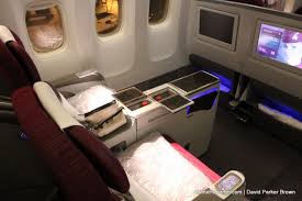 flying on a qatar airways 777 300er