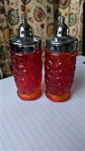 salt and pepper shakers sunburst red glass