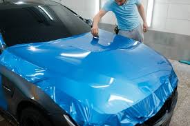 You can avoid the stress of repairing or waxing over the scratches by wrapping your vehicle's body with paint protection film. Premium Photo Car Paint Protection Film Installation