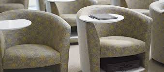 Its casual design makes it suitable for many different settings. Lounge Chair With Tablet Arm Sirena Global