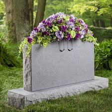 This easy to use headstone flower anchor adheres to the top of the stone, and then clips to the bottom of the arrangement, keeping it tethered to the stone. Floracraft Floral Tombstone Hugger Green Michaels