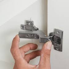 how to adjust loose cabinet hinges
