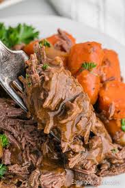 slow cooker venison roast eating on a