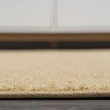 jonathan y haze solid low pile mustard 5 round area rug