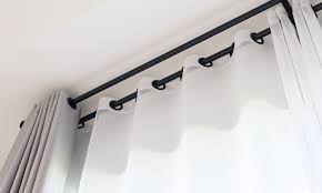 what are traverse curtain rods
