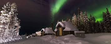 northern lights village family snow holiday