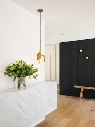 Be inspired by this stylish bespoke coat cupboard and floor to this dark green and light grey hallway with wood flooring is light and welcoming: Hallway Ideas 37 Clever Design Tricks And Schemes For A Fresh Look Livingetc