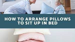 how to arrange pillows to sit up in bed