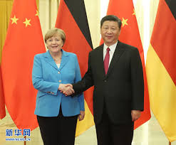 What have been the moments that have defined her political career? Xi Jinping Holds Meeting With Chancellor Angela Merkel Of Germany