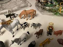 lot of miniature plastic toy farm