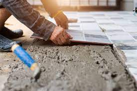 How to Prepare for Laying Tile Over a Concrete Floor
