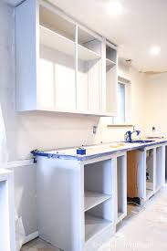 A coat of primer and two coats of enamel cabinet paint should be enough, but if you need to, you can always apply. Painting Kitchen Cabinets Houseful Of Handmade