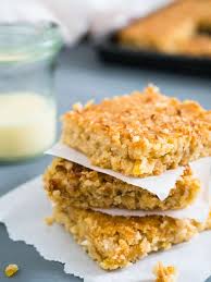 tropical coconut squares taste like candy bars three delicious layers topped with sweetened condensed milk