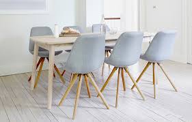 Rounded shapes of the dining table and chair makes home more comfortable and safety. Orson Extending Dining Table Set With 6 Grey Chairs