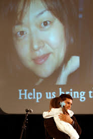 Lee, Ling supporters hold vigil to keep case in spotlight - Lee.Ling.SF.ap.cpj