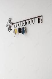 Various Keys Hanging On Hook Photo