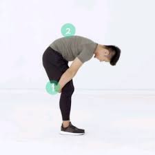 standing lower back stretch by
