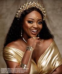 jackie appiah shines in gold on the