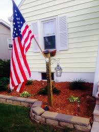 Consider this incredible photo gallery of front yard garden ideas. Memorial Day Project Address Display Post 4x4 Deck Post Solar Cap Light Flag Mount And Lantern Flower H Garden Flag Pole Flag Pole Landscaping Flag Display