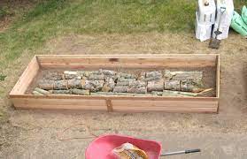 Logs In Raised Garden Bed Inhabitat
