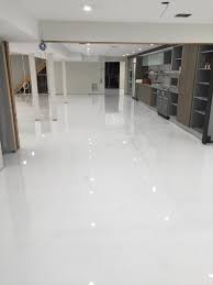 We compare cost, colors, prep time, application shortcuts, and durability to help you transform your garage into a special space. White Metallic Epoxy Floor Google Search Metallic Epoxy Floor Epoxy Floor Basement Epoxy Floor