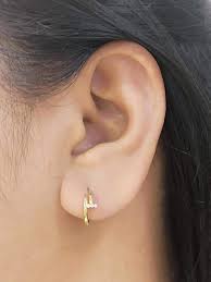 18k saudi gold cartier nail earrings