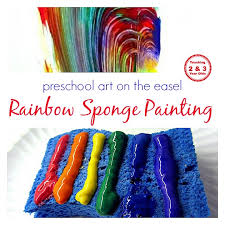 rainbow sponge painting on the easel