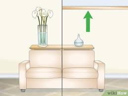 decorate a sofa table behind a couch