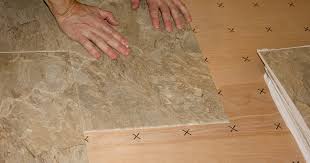 expert advice how to tile onto wood