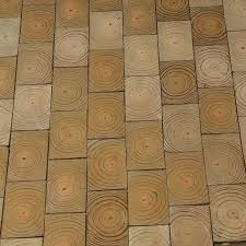 The slices are glued into place and grout is applied to fill in the spaces between the slices. The Ends Of Your Timber Can Be Used To Create Incredible End Grain Floors Useful Tips For Home