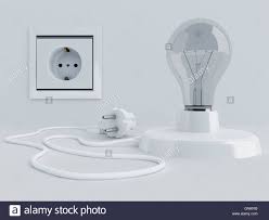 Lamp With Light Bulb And Electric Plug Near Electric Socket