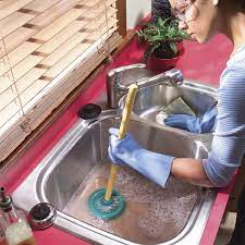 clean and unclog a kitchen sink drain